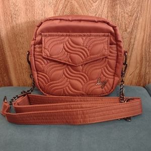 Lug Swing purse in copper brown